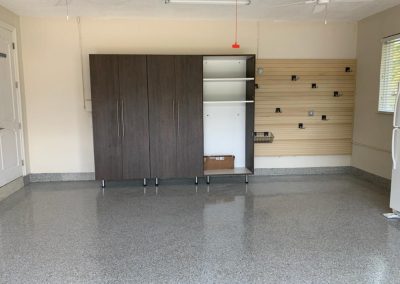 Cabinetry, PVC Slatwall, Floor Coating, and Monkey Bar Storage Installation (Miami, Florida)